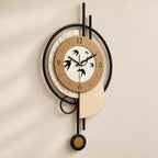 Horloge murale avec pendule et hirondelles — 70 cm — vue de trois quarts